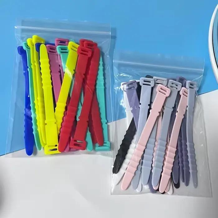 5 attaches-câbles en silicone : Gardez les câbles bien organisés et sans nœuds !